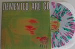 Demented are Go Kicked Outta of Hell green and pink splatter Vinyl